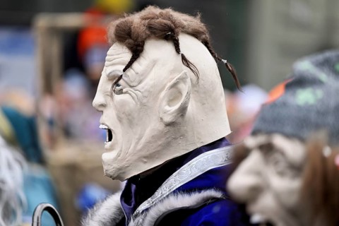 Person dressed up as a goth at the Wey guild on Rose Monday, Güdismäntig, Lucerne Carnival 2024,