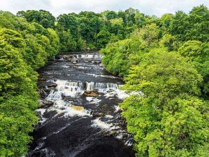 Aysgarth Falls on River Ure from a drone, Yorkshire Dales National Park, North Yorkshire, Englan
