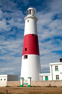 Red and white lighthouse on the coast at Portland Bill, Isle of Portland, Dorset, England, United