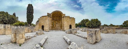 Panorama of view of ancient ruins of Titus Basilica, in the foreground remains of stones foundation
