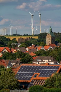 Wind farm near the East Westphalian town of Energiestadt Lichtenau, many residential buildings with