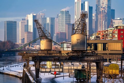 The skyline of Frankfurt am Main, skyscrapers of the banking district, historic harbour cranes at