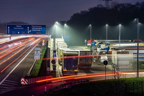 Heavy traffic on the A2 at the Schwarze Heide rest area, Bottrop, overcrowded car park for trucks