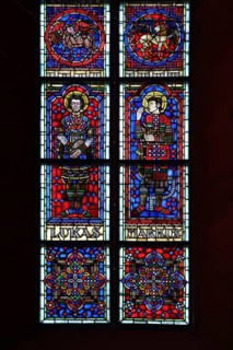 Colourful stained glass window with apostle Luke and Mark, evangelist, two, figures, biblical,