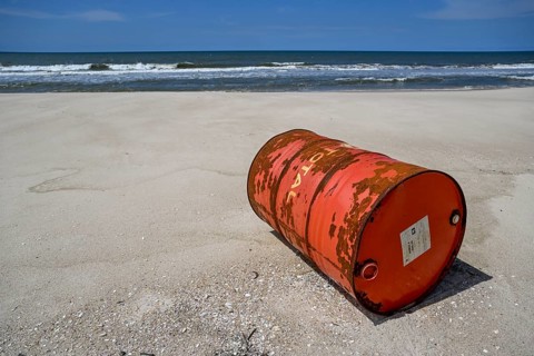 Washed up oil drum on the beach, Loango National Park, Parc National de Loango, Ogooué-Maritime