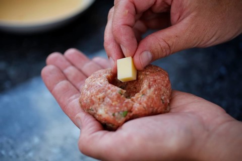 Swabian cuisine, preparation of meatballs in an almond shell, mixed minced meat, raw, meatballs