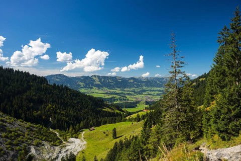 Illertal near Oberstdorf, behind the group of listeners, Allgäu, Bavaria, Germany, Europe