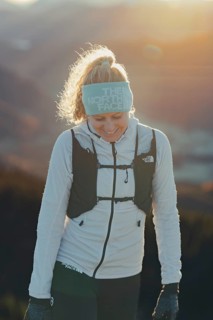 Trail running in autumn on the Jochberg on Lake Walchensee against the wonderful backdrop of the