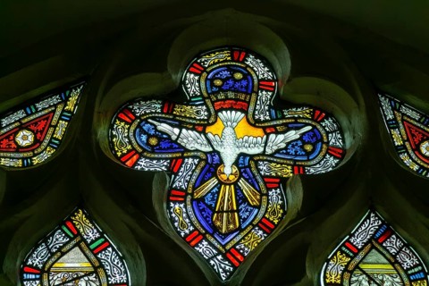 Detail of stained glass window by Charles Eamer Kempe, church of Saint Botolph, Burgh, Suffolk,