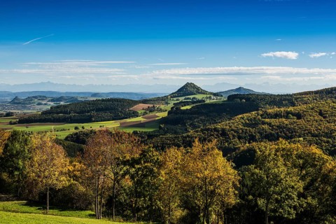 Hegau volcanoes Hohenhewen and Hohenstoffeln, behind them the Swiss Alps, near Engen, Hegau,
