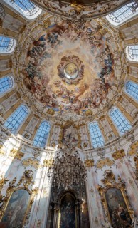 Interior of the baroque church with ceiling paintings and altar, Ettal Abbey, baroque Benedictine