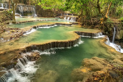 The multi-levelled Kuang Si waterfall near Luang Prabang, Laos, Asia