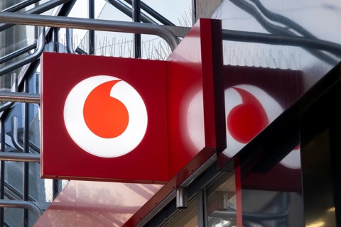 Vodafone, facade with sign and logo, illuminated, Essen, Ruhr area, North Rhine-Westphalia,
