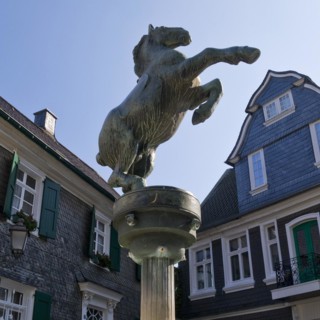 Horse fountain by Rudolf Christian Baisch in front of the town history centre, Mettmann, Bergisches