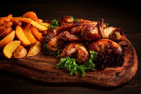 Fried chicken wings, with potatoes, and spices, homemade, fast food, no people