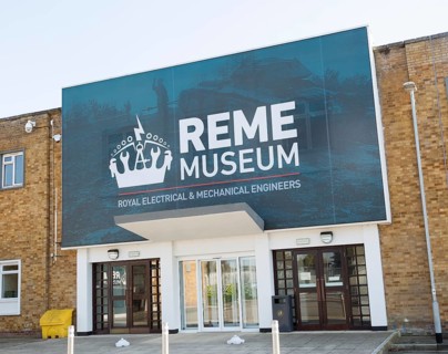 Sign at entrance to REME museum, MOD Lyneham, Wiltshire, England, UK