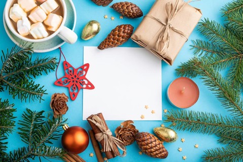Christmas or New Year composition, template. Decorations, box, cinnamon, cones, fir and spruce