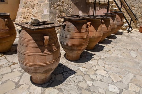 Large earthenware storage jars in the courtyard of Odigitria Monastery, Unesco Site Orthodox Greek