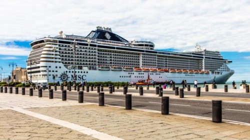 Piazza Unità d'Italia borders directly on the sea with cruise ships, Trieste, harbour city on the