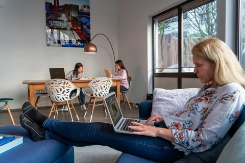 Homeschooling, during the lockdown in January 2021, children learning at home for school, a girl in