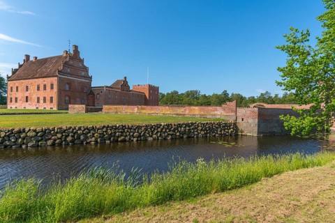Broholm Castle, Gudme, 14th century, brick building, fortification, stone wall, water plants,