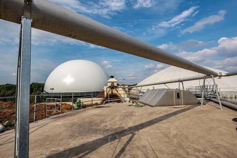 Biogas plant, gas storage, with dome, use of solid manure as energy source, gas pipelines, on a