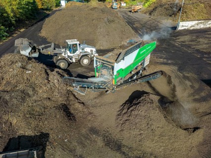 Composting plant, organic waste is composted, sorted by size, smaller parts are reused as compost,