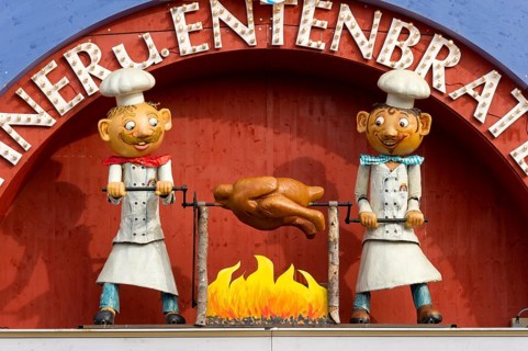 Figures, cooks grilling duck, decoration of the chicken and duck roast at the Wies'n, Oktoberfest,