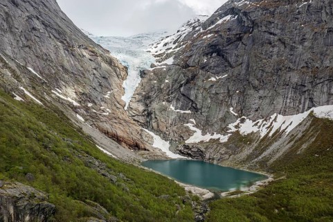 Aerial view of glacier Briksdalsbreen, a glacier tongue of Jostedalsbreen, glacier lake, Norway,