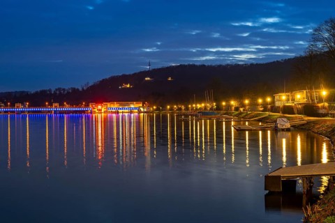 Lake Baldeney, illuminated dam, lake promenade, lock, left and hydroelectric power plant power
