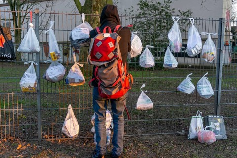 Gift fence with donations for the homeless and needy, food, hygiene articles, clothing, in Essen