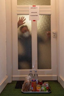 Symbolic image Domestic quarantine, man is in isolation at home due to a suspected corona