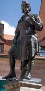 Sculpture by Peter-Henlein, inventor of the pocket watch, fountain figure on Hefnersplatz,