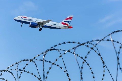 Symbolic image of security, British Airways, security fence, Stuttgart Airport, Baden-Württemberg,