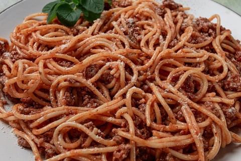 Spaghetti bolognese, in a frying pan, top view, homemade, no people