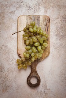 A branch of white grapes, wine grapes, Georgian grape variety Rkatsiteli, top view