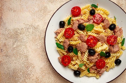 Tuna salad, fusilli pasta, olives and cherry, olive oil, homemade