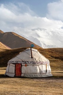 Yurt in front of Lenin Peak, Pamir Mountains, Osh Province, Kyrgyzstan, Asia