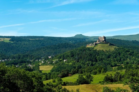 View of the medieval castle of Murol in the Auvergne Volcanoes Regional Natural Park, Puy de Dome,