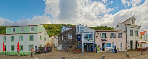 Panoramic view of the whaling and fishing village of Lajes do Pico an empty street with colourful
