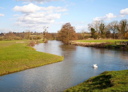 A tributary joining the River Stour at a confluence of waters at Dedham, Essex, England, United