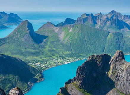 View over fjord Örnfjord, village Fjordgard, peak of Segla (left) and Hesten, seen from mountain