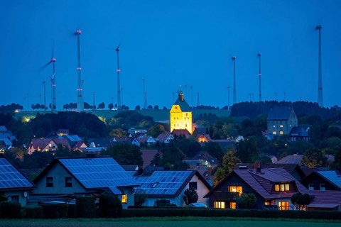 Wind farm above the village of Lichtenau, self-proclaimed energy town, houses with photovoltaic