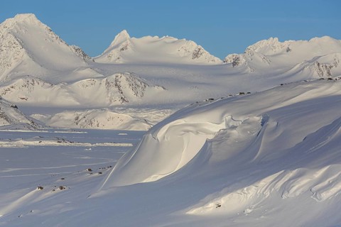 Mountainous winter landscape in the Arctic, sunny, Kulusuk, East Greenland, Greenland, North