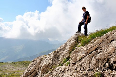 Ten-year-old boy hiking, Nebelhorn, Allgäu Alps, Bavaria, Germany, Europe