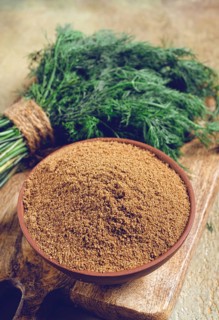 Dried dill, in a ceramic bowl, a bunch of fresh dill, seasoning, top view, no people