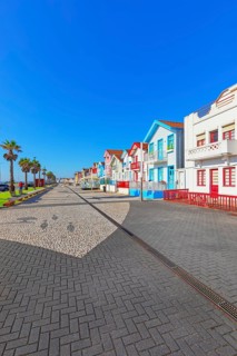 Brightly painted beach homes, Costa Nova do Prado, Aveiro, Portugal, Europe