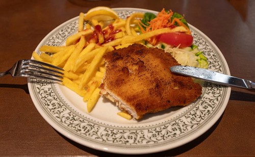 Breaded Wiener Schnitzel with French fries, Bavaria, Germany, Europe