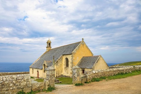 Old Chapelle Saint-They at Pointe du Van in Bretagne with a seascape view, Crozon peninsula,