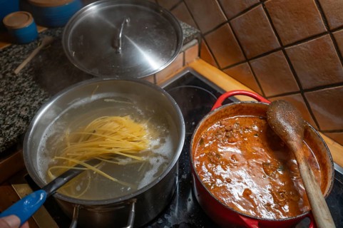 Spaghetti bolognese is prepared on the cooker, Mecklenburg-Vorpommern, Germany, Europe